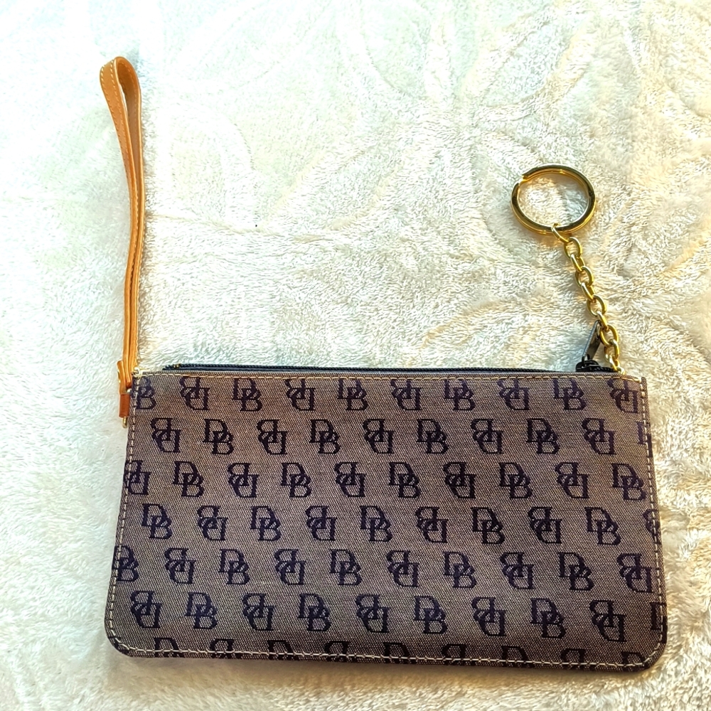 Dooney & Bourke blue/cream wristlet with tan leather trim, EUC 8" x 4"